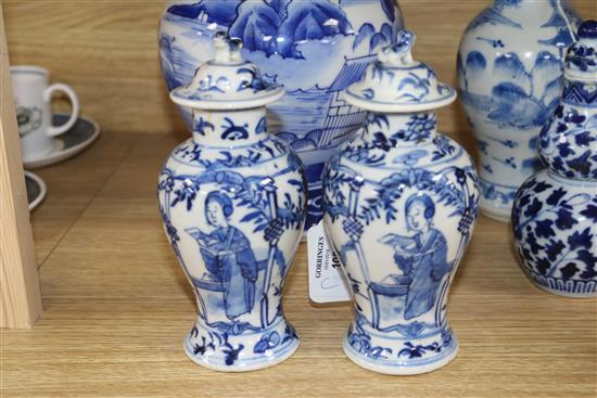 An Asian blue and white inverted pyriform jar and cover, a similar pair of smaller vases and two other items, H 25cm (largest)